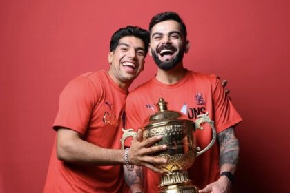 Swastik Chikara with Virat Kohli